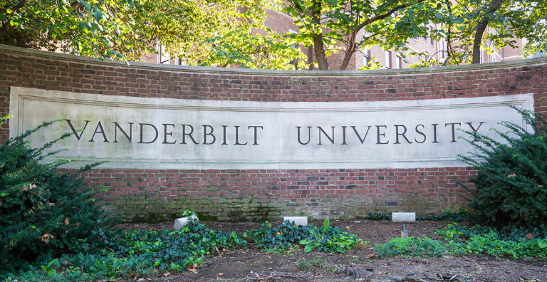 Vanderbilt University sign on brick wall