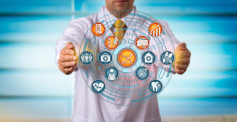 Man holding a graphic with healthcare logos