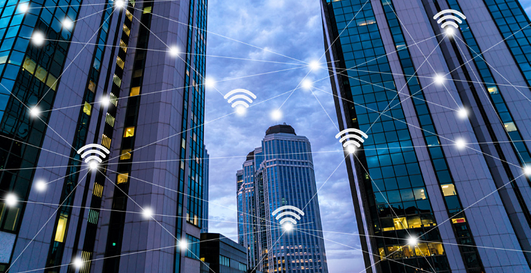 tall buildings with wifi icon overlaid