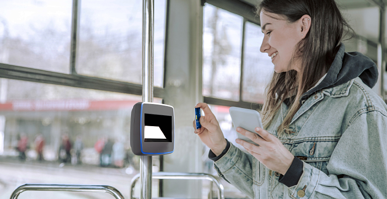 person using contactless fare payment for public transportation