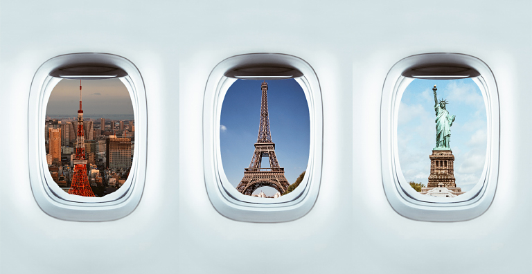 Airplane windows showing the Tokyo Tower, Eiffel Tower and Statue of Liberty, conveying digital travel credentials