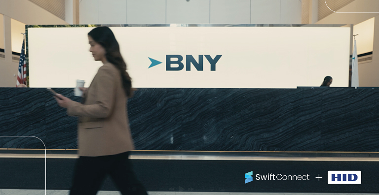 woman walking in BNY office plus SwiftConnect and HID logos